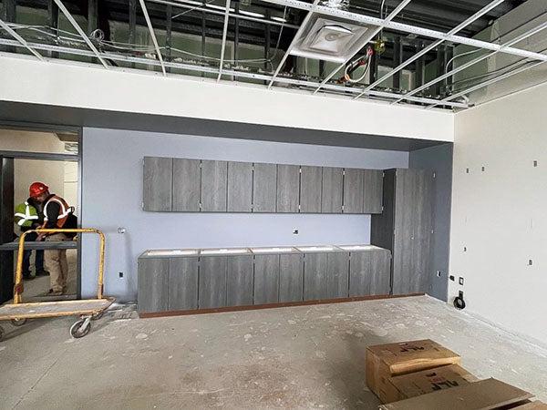 cabinets in a large unfinished room